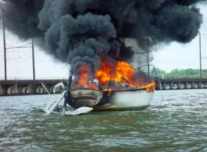 gasoline and propane leak boat on fire